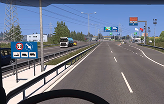 Yolun solundaki trafik işaretleri — kamyon sürücüsü davranışı